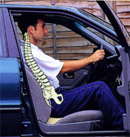 Improved position of spine when using a wedge cushion in a car