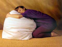Picture of pregnant woman relaxing on a bean bag