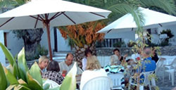 Dining outside at Cortijo Romero centre, Spain