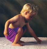 Child squatting in perfect balance