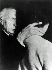 Picture of F. M. Alexander guiding a woman's neck with his hand